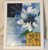 Framed blue and yellow flower artwork