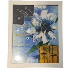  mixed media artwork painting in vibrant colors.  framed in a white frame.  paper collage flower with white paper and gold foil.  