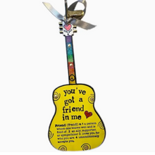  5 Inch Guitar Shaped Ornament: A charming and unique home decor item.
"Friend" Themed Artwork: Features beautiful and inspiring artwork related to friendship.
Versatile Hanging Options: Includes small clips for easy attachment to curtains, lamps, and more.
Perfect Gift Size: Makes a thoughtful and memorable gift for friends, music lovers, or anyone who appreciates unique decorations.