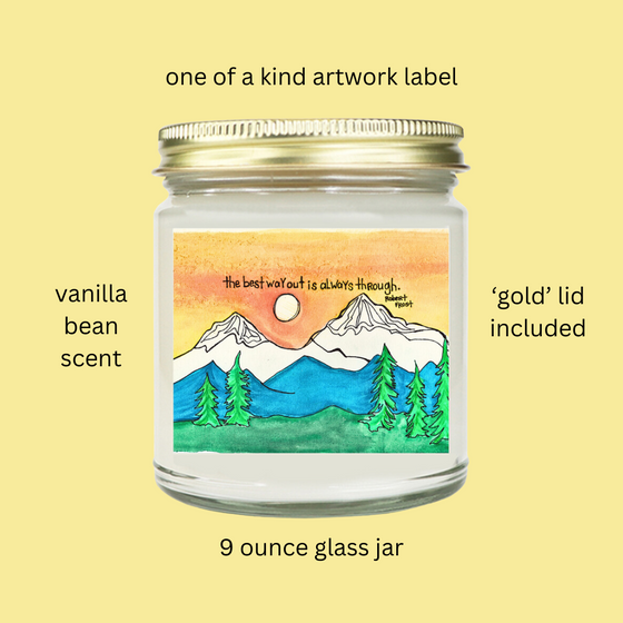 this is a 9 ounce glass jar candle with a Robert frost quote and landscape art ion the front label 