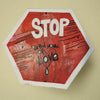 stop in the name of love is an original hexagonal shaped mixed media painting on stretched canvas.  it is 10 inches wide and features vibrant red and silver colors.  It is an original one of a kind artwork by emerging artist Christine C.