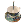 this set includes a tea cup, saucer and spoon.  the print is vincent van gogh "blue iris'